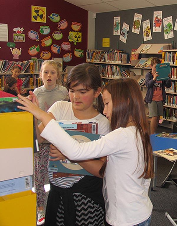 Girls in school library